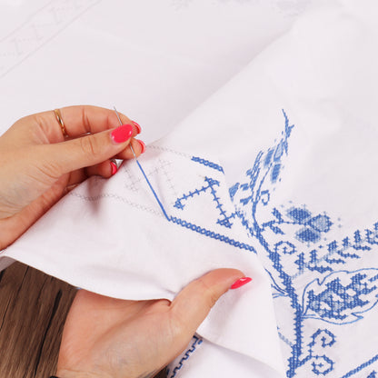 Cross stitched cotton tablecloth with blue floral design