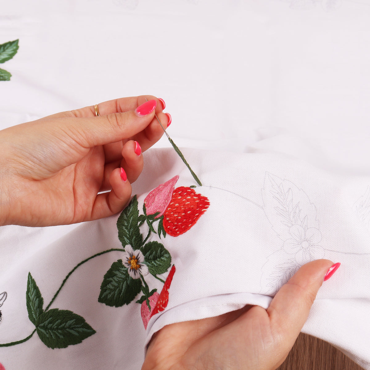 Embroidered cotton tablecloth with strawberry design