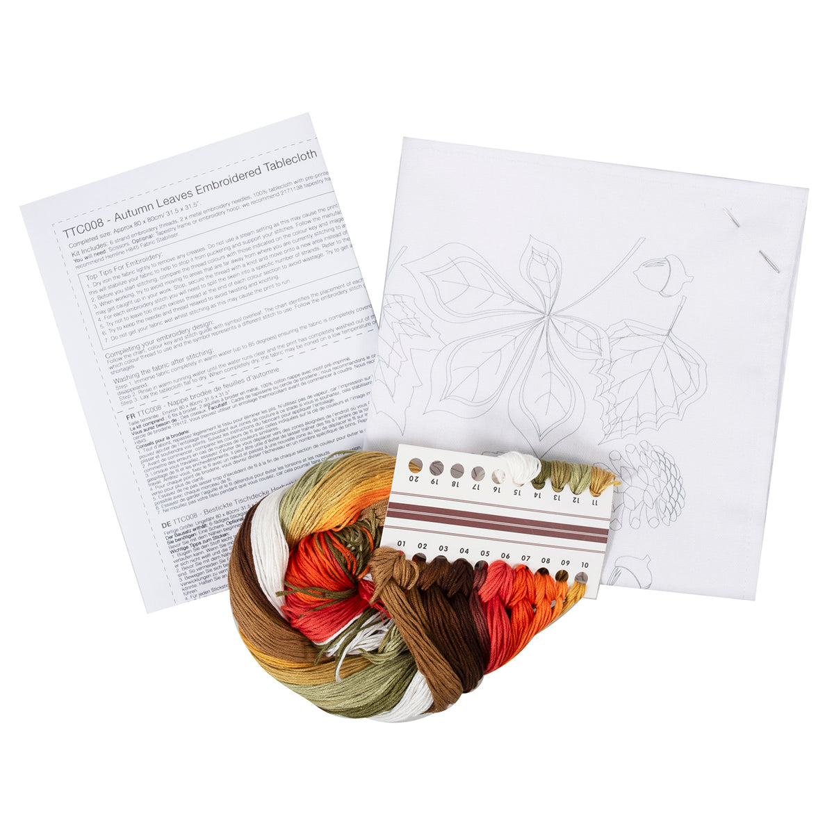 Embroidered cotton tablecloth with autumn leaves design