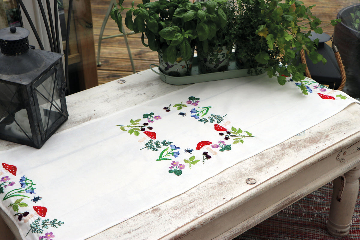 Trimits Toadstools embroidery table runner kit with printed design