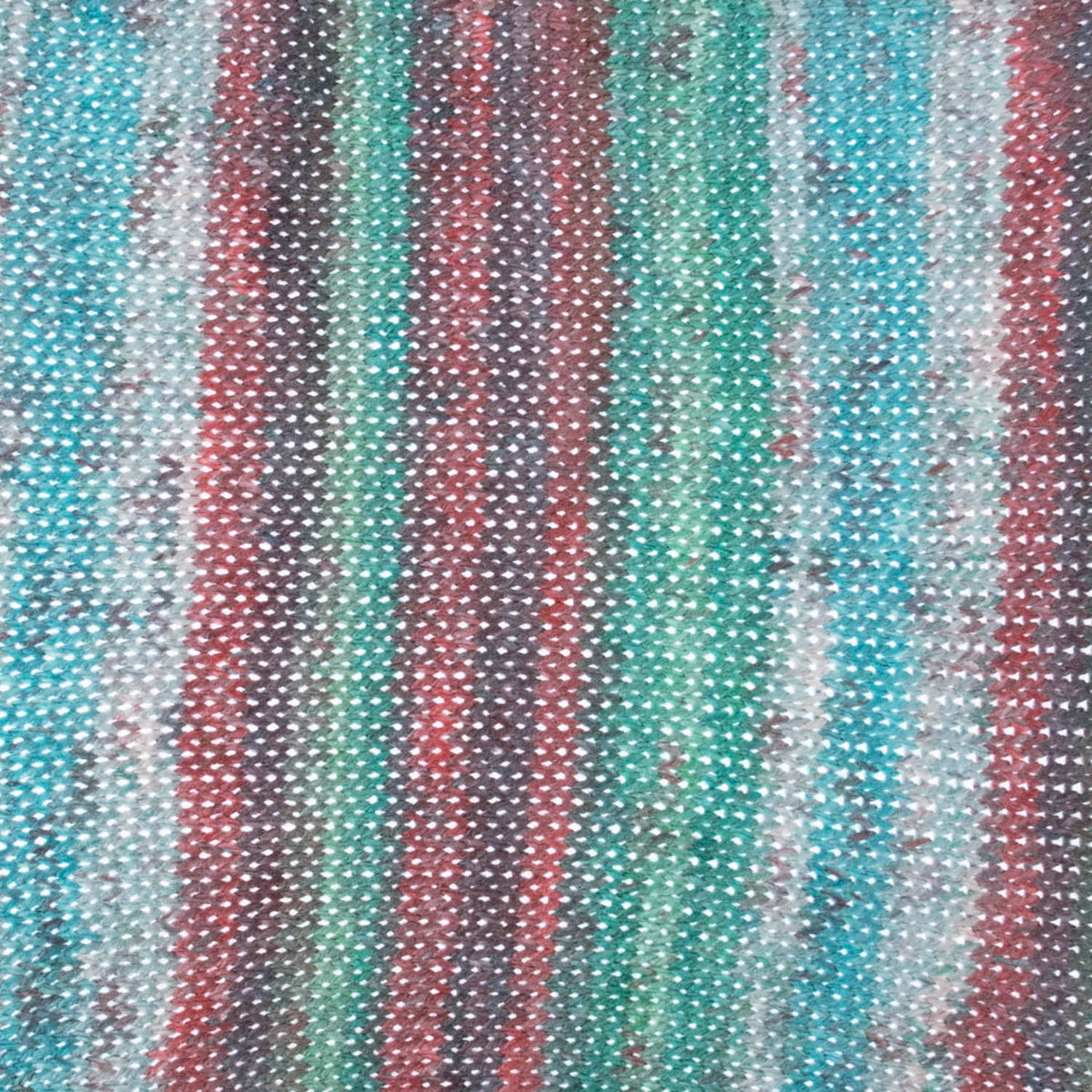 Ball of Trimits Print double knitting yarn in Berry