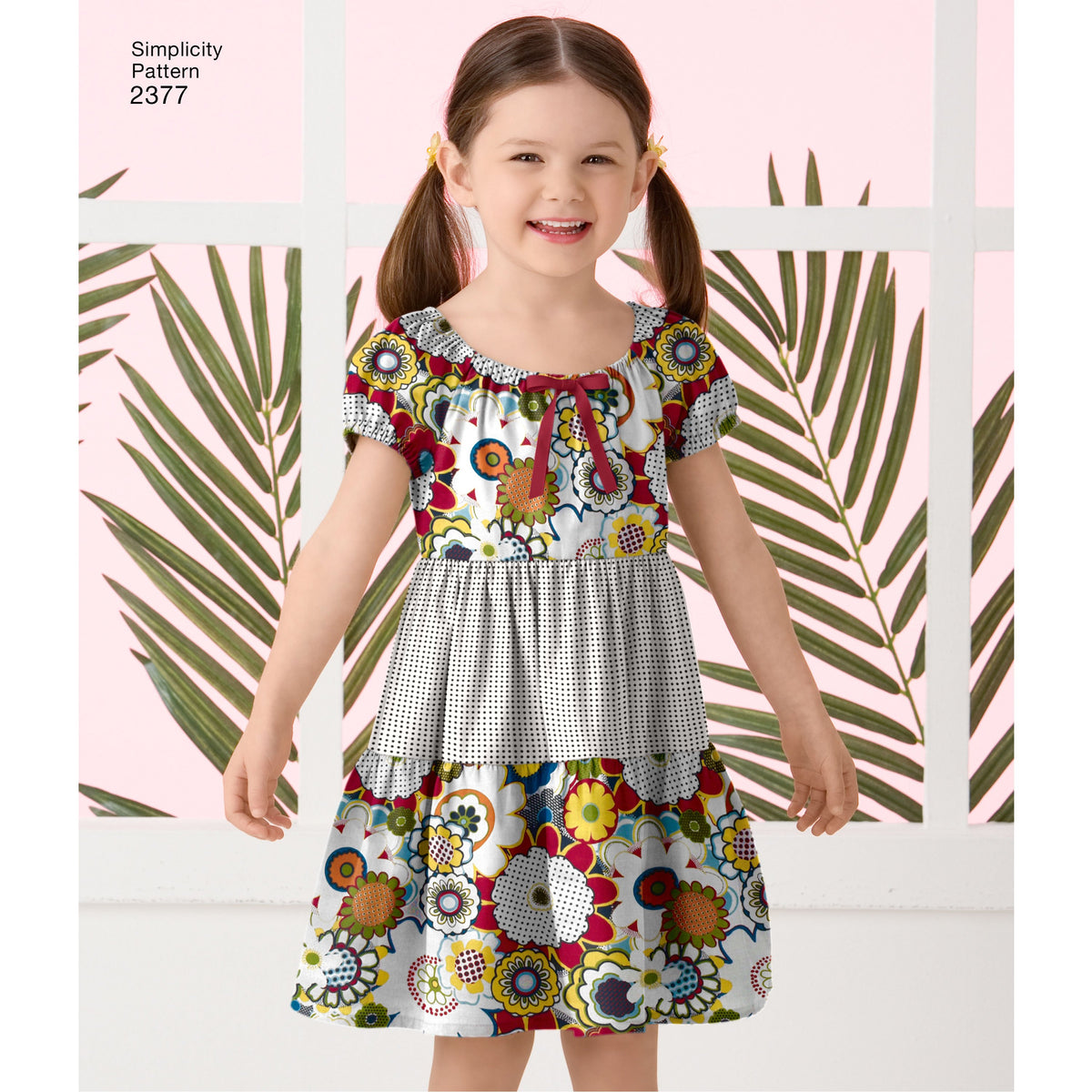 Simplicity S2377 sewing pattern envelope showing child's easy to sew dress