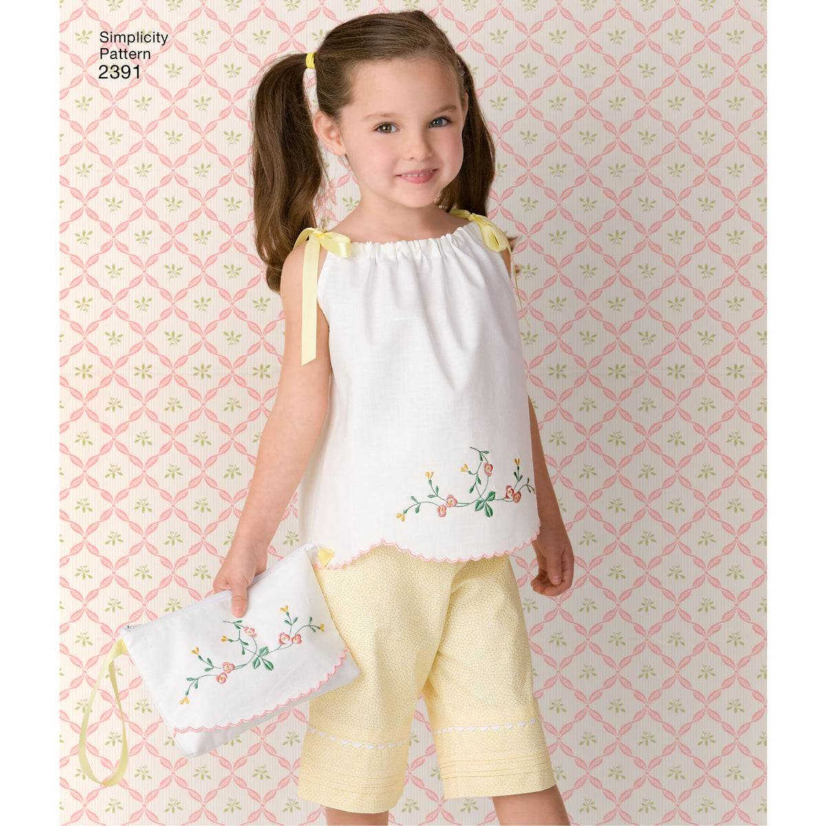 Simplicity S2391 sewing pattern envelope showing child's dress, tops, trousers and bag