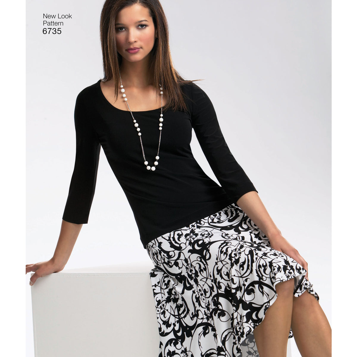 New Look N6735 sewing pattern envelope showing a knit cardigan, tops, trousers and a skirt