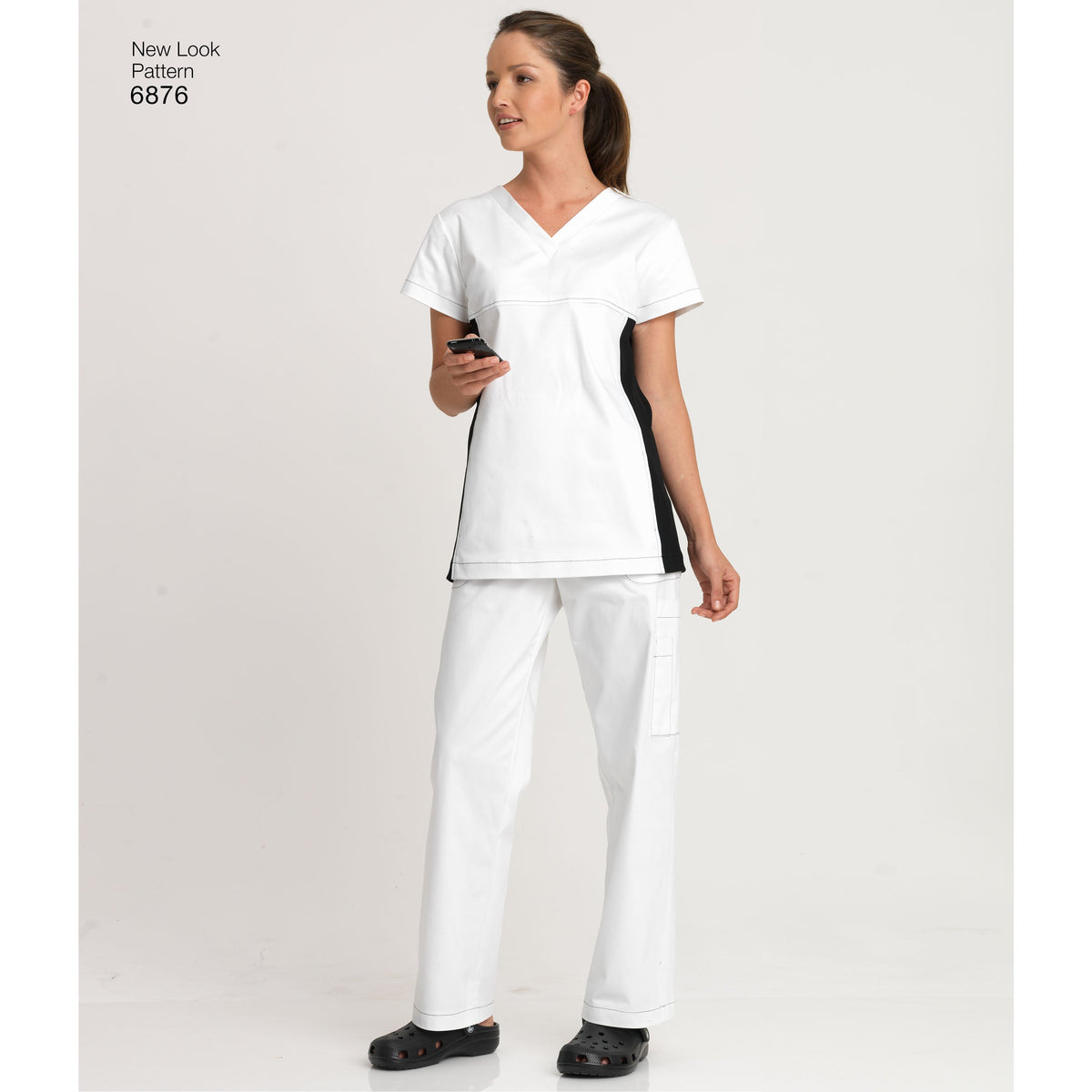 New Look N6876 sewing pattern envelope showing a scrub top and trousers, plus a misses' scrub top