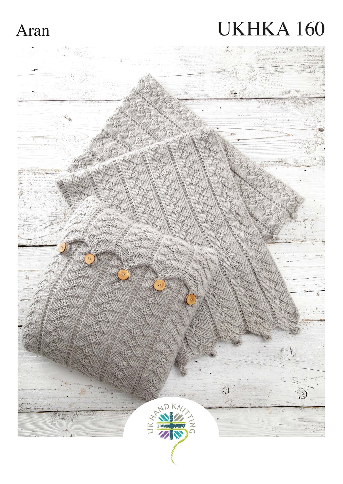 Aran cushion and blanket knitting pattern cover