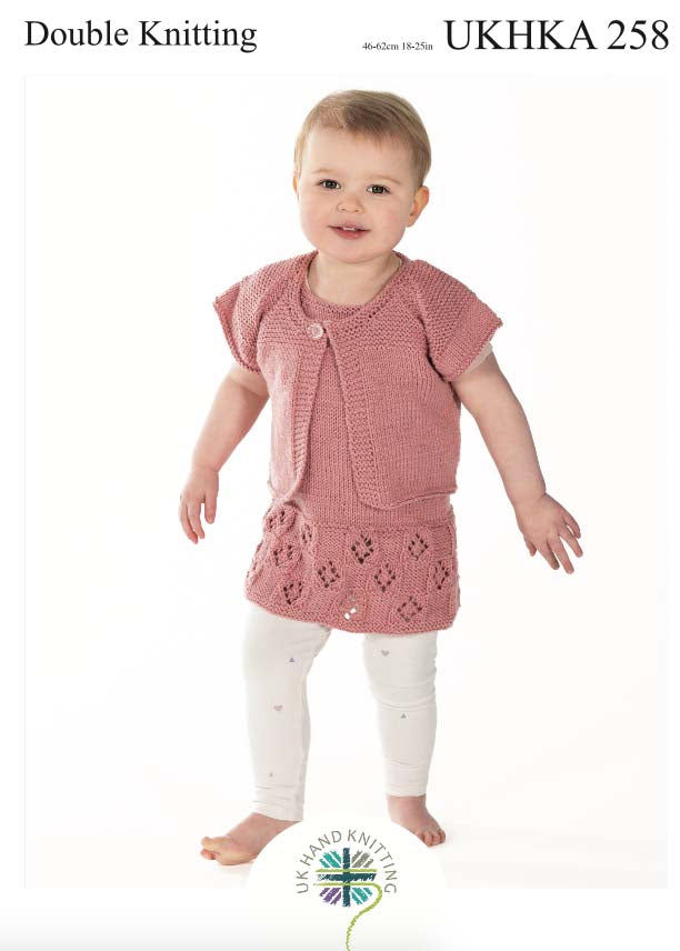Cover of a UK Hand Knitting Association knitting pattern showing a child's pinafore, dress, cardigans and hat