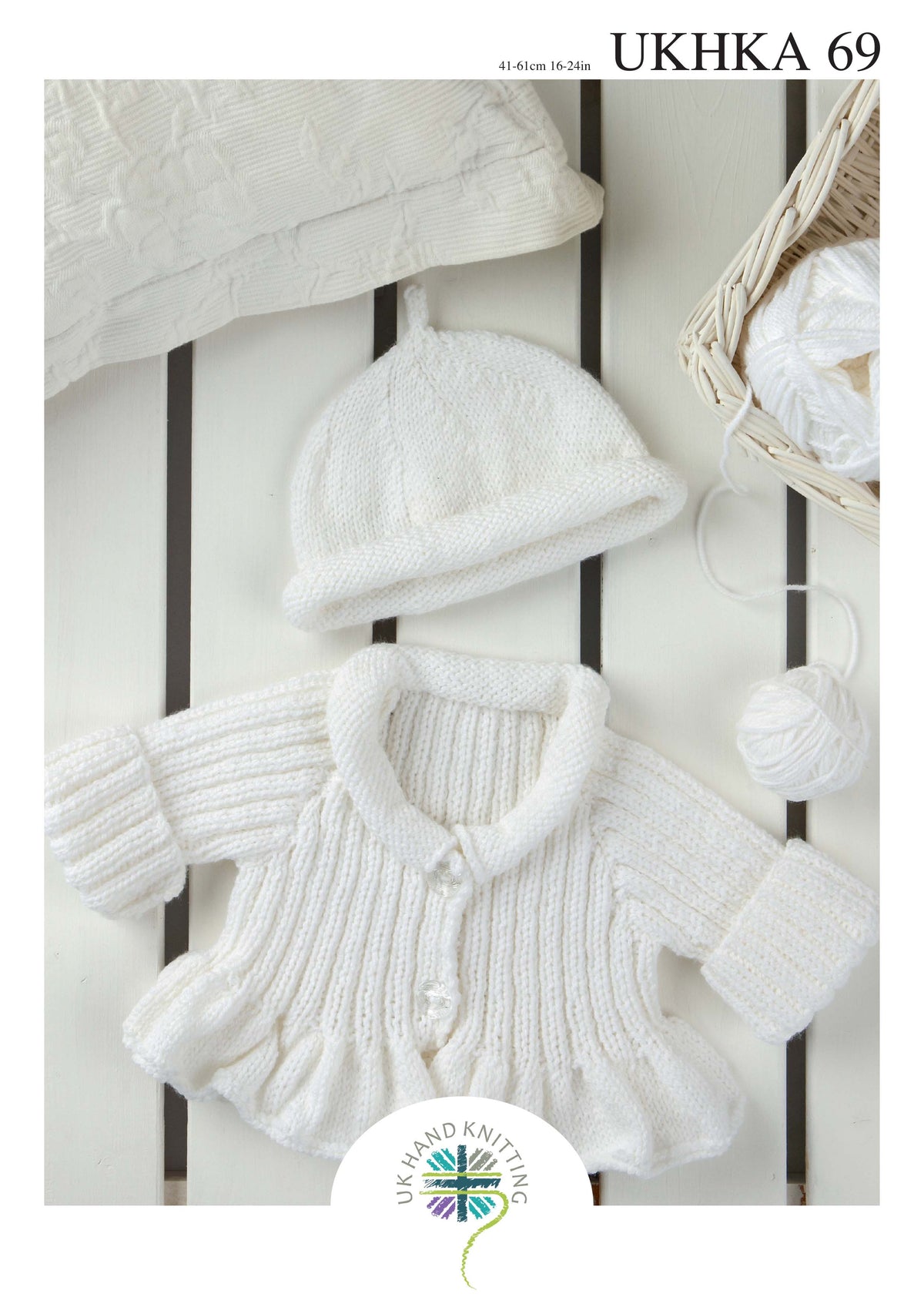 Knitting pattern cover showing a child's ribbed cardigan and hat