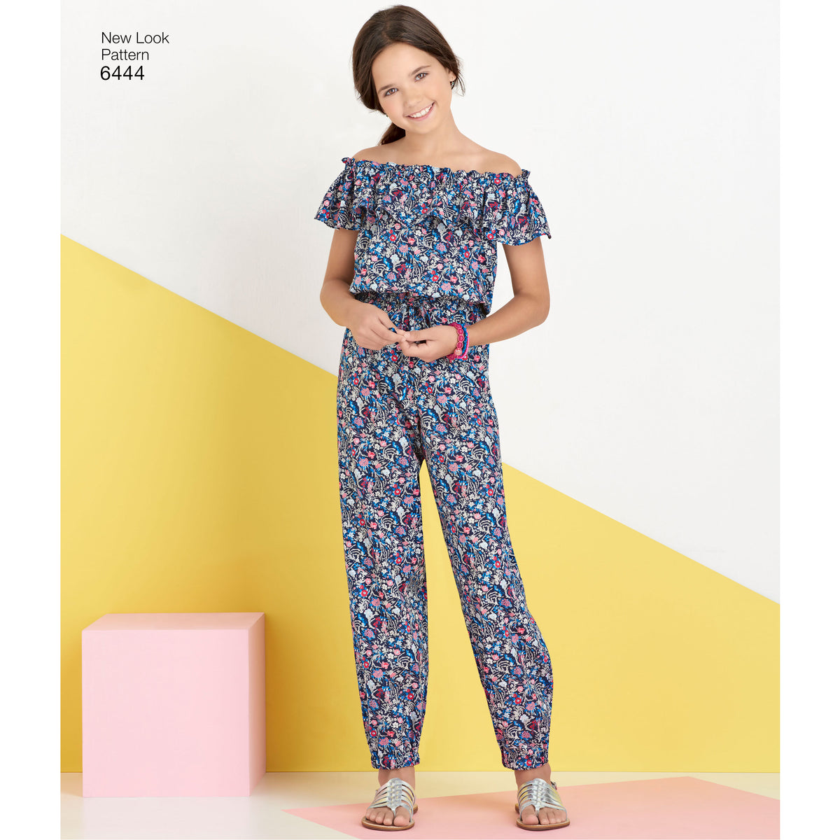 New Look N6444 sewing pattern envelope showing girls' dress and jumpsuit designs