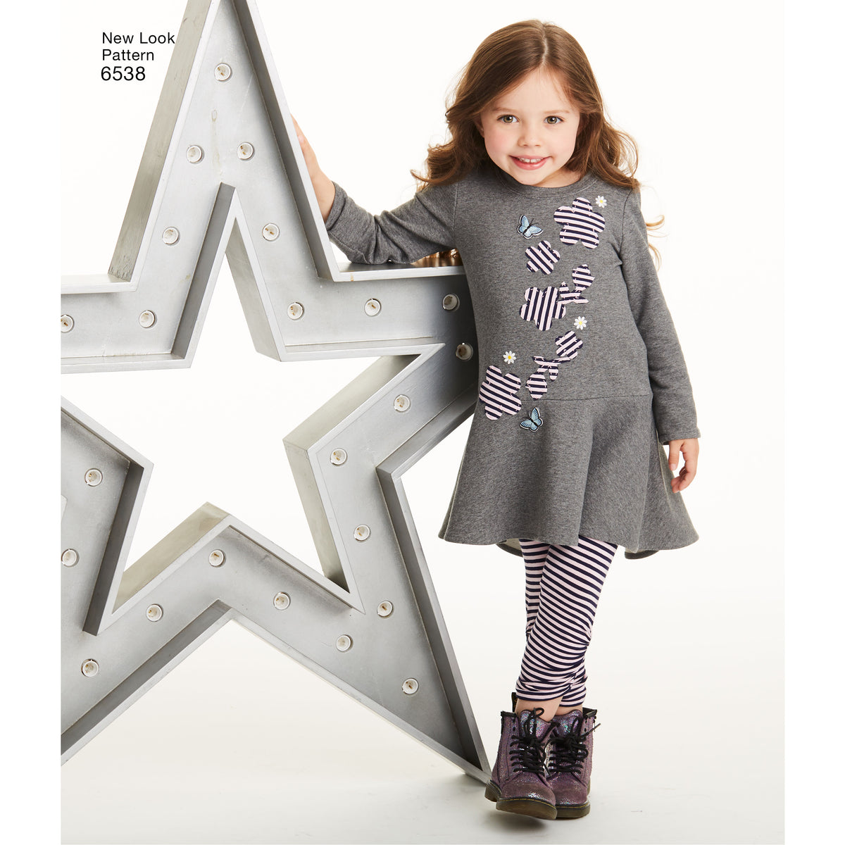 New Look N6538 sewing pattern envelope showing children's dress and leggings