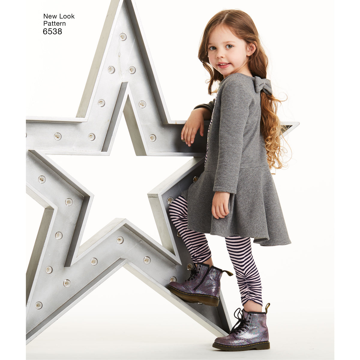 New Look N6538 sewing pattern envelope showing children's dress and leggings