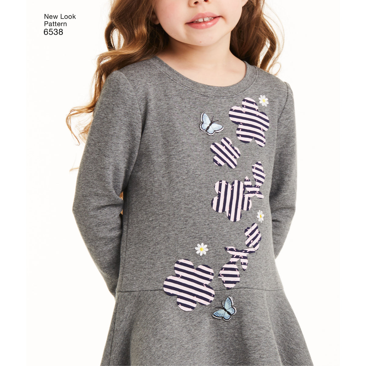New Look N6538 sewing pattern envelope showing children's dress and leggings