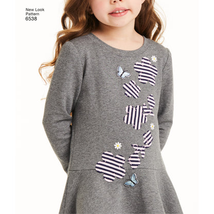 New Look N6538 sewing pattern envelope showing children's dress and leggings