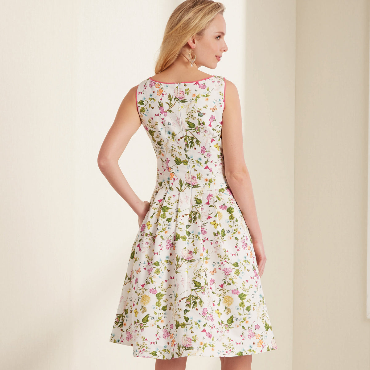 New Look N6665 sewing pattern envelope showing dresses with piping and skirt pleats designs