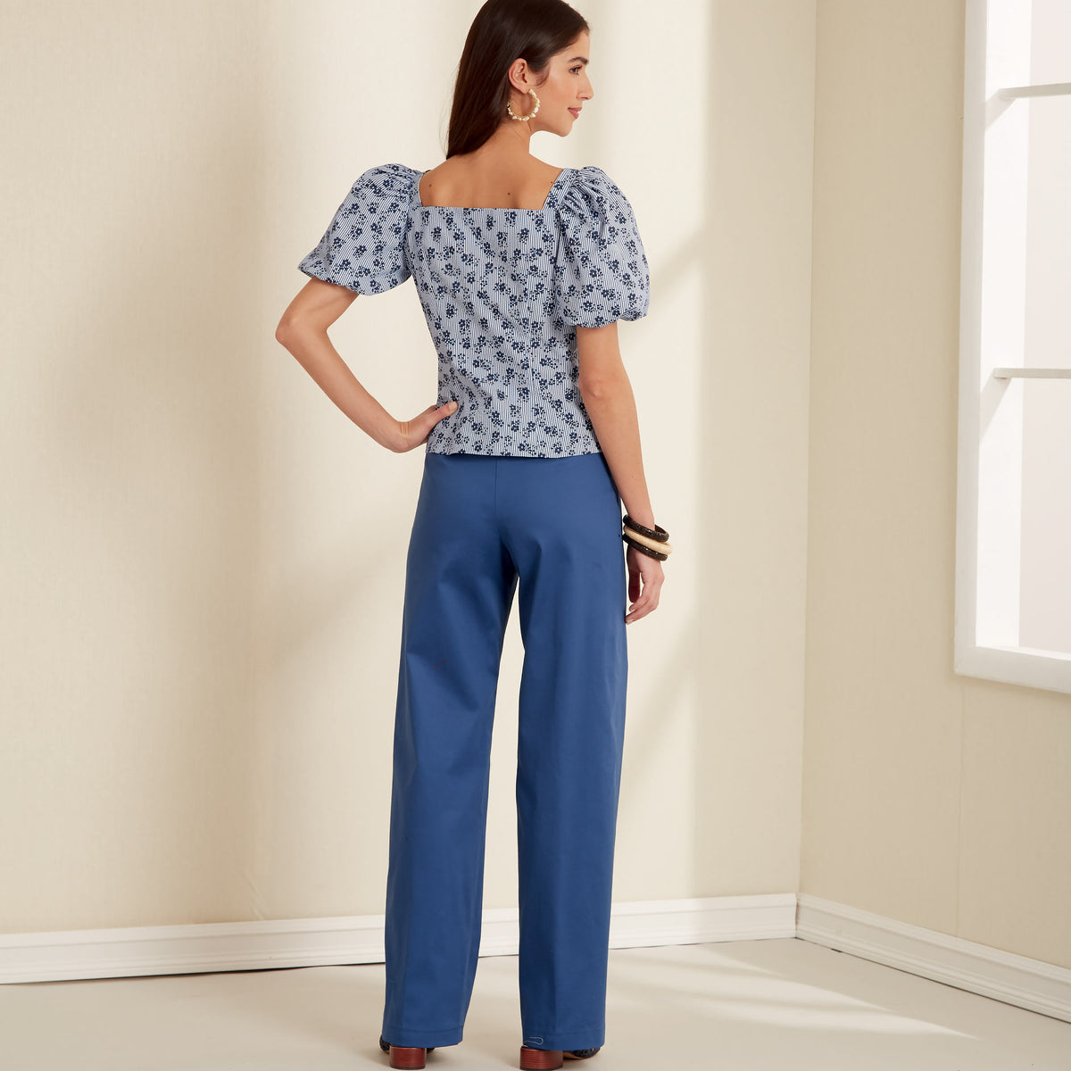 New Look N6678 sewing pattern envelope showing button-front top and trousers designs