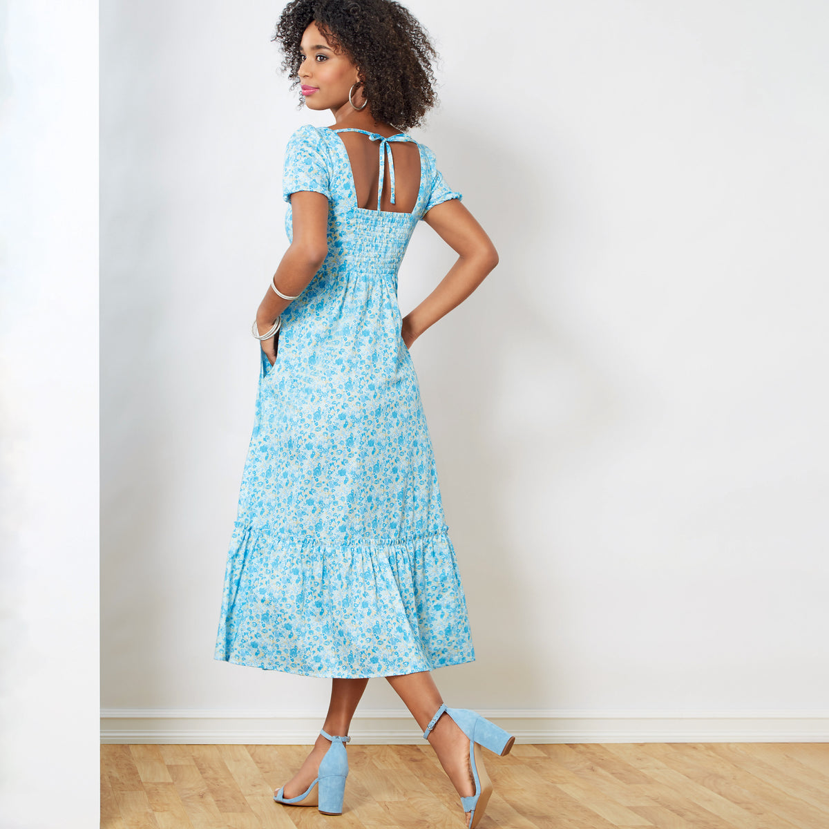 New Look N6692 sewing pattern envelope showing smocked back dresses designs