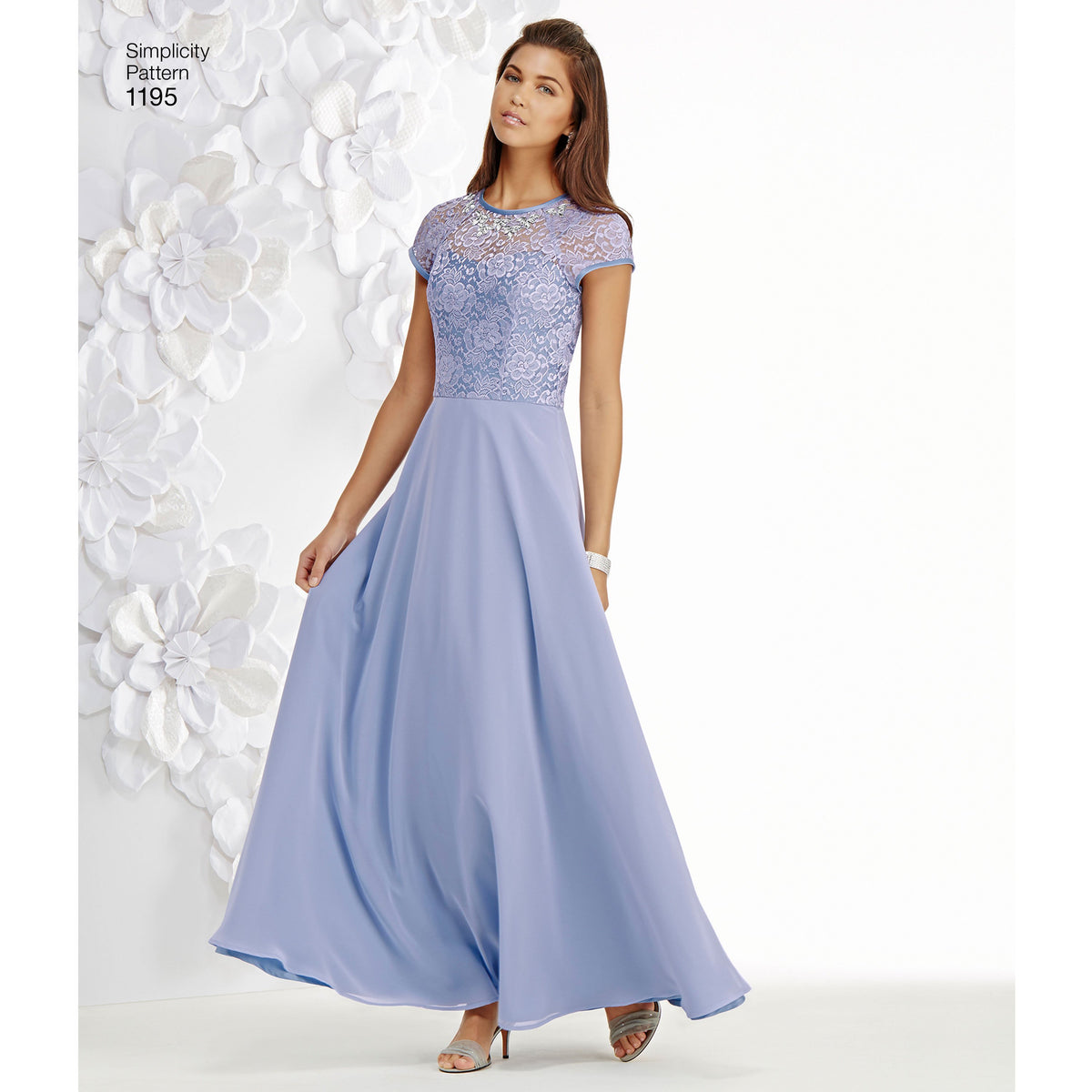 Simplicity S1195 sewing pattern envelope showing a floor length and a knee length occasion dress
