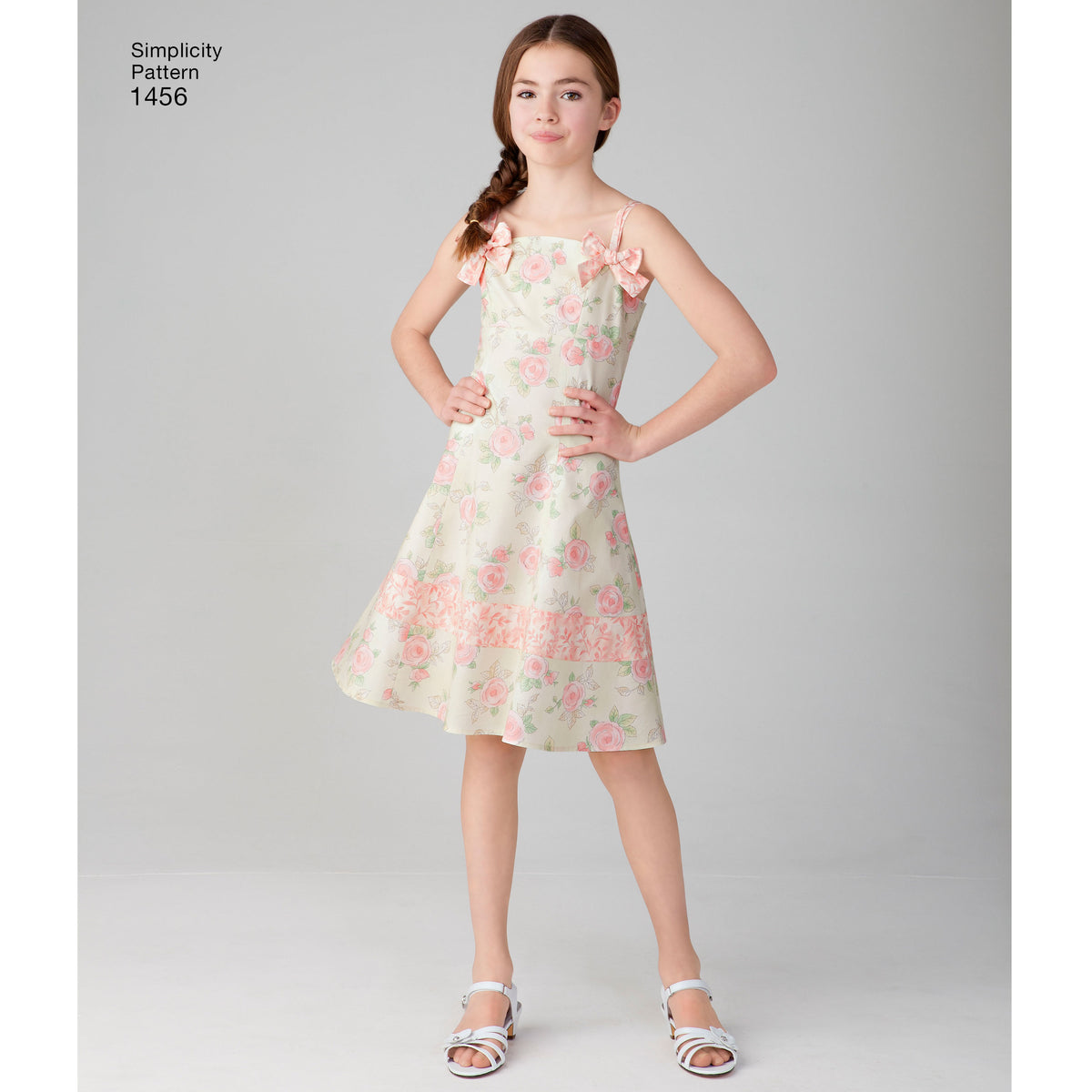 Simplicity 1456 pattern envelope showing girls' flared dresses