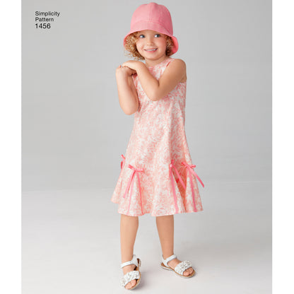 Simplicity 1456 pattern envelope showing girls' flared dresses