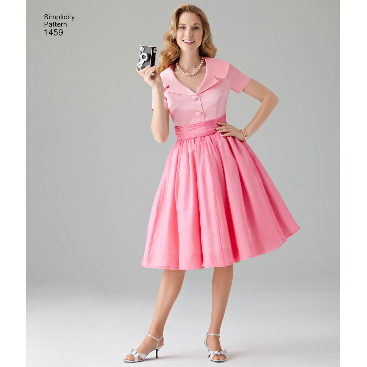 Simplicity 1459 pattern envelope showing 1950s-style dresses
