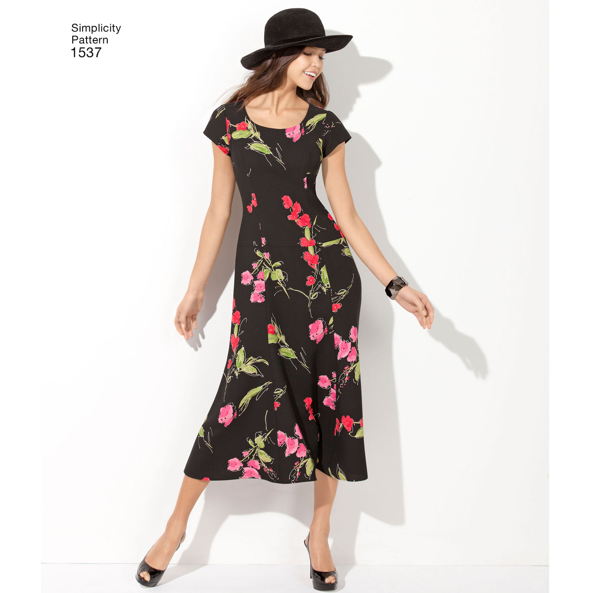 Simplicity 1537 pattern envelope showing women's dresses