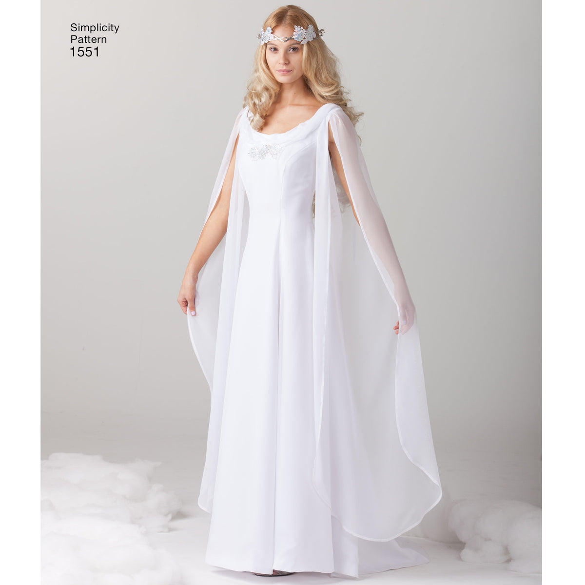 Simplicity 1551 pattern envelope showing a white gown with sheer sleeves and a grey gown with cape