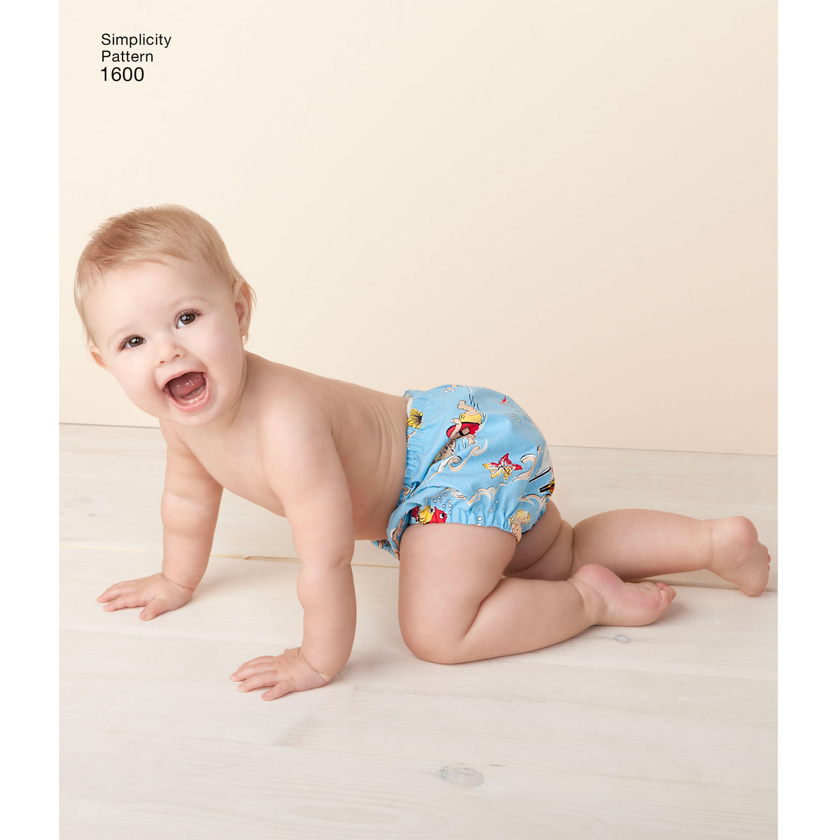 Simplicity S1600 sewing pattern envelope showing vintage baby romper and bonnet