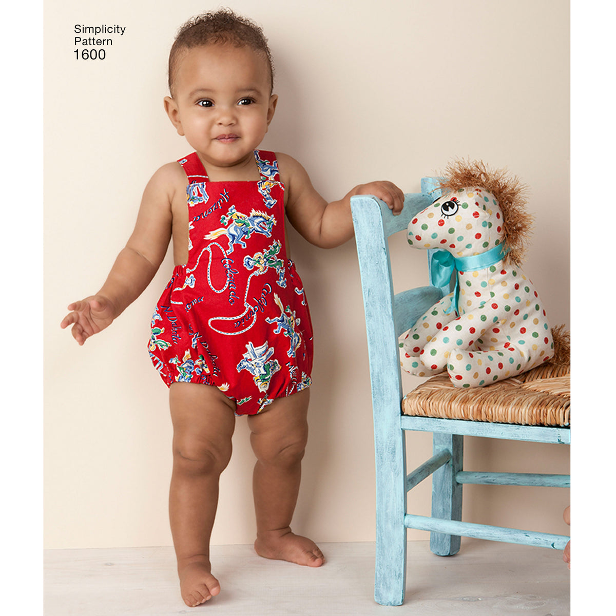 Simplicity S1600 sewing pattern envelope showing vintage baby romper and bonnet