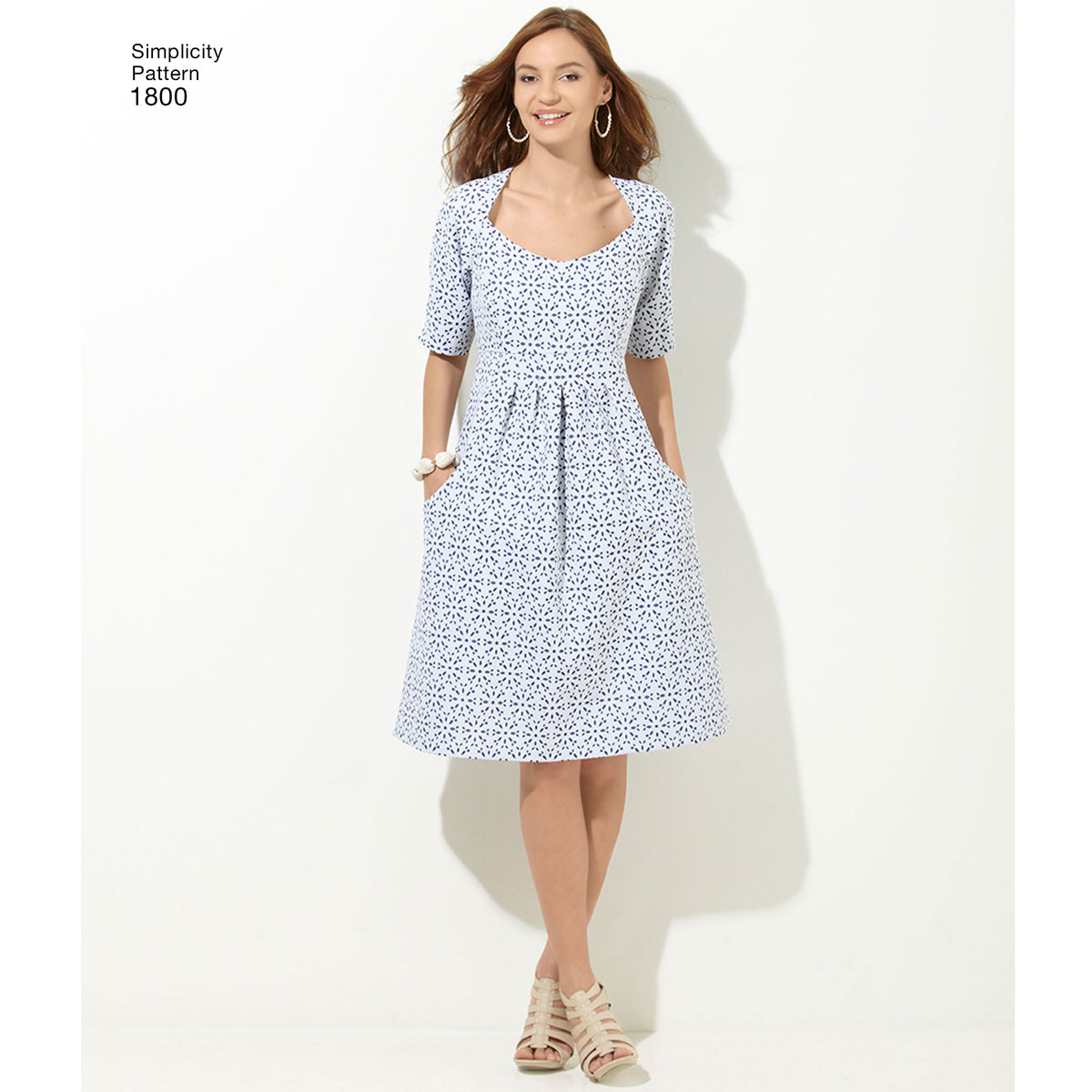 Simplicity S1800 sewing pattern envelope showing plus size dress
