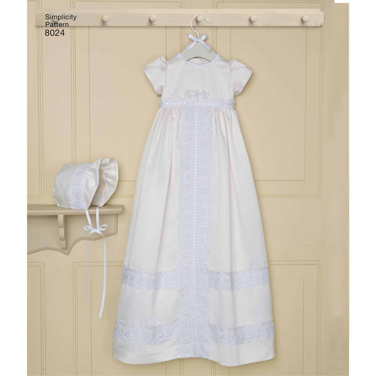 Simplicity S8024 sewing pattern envelope showing baby christening gown