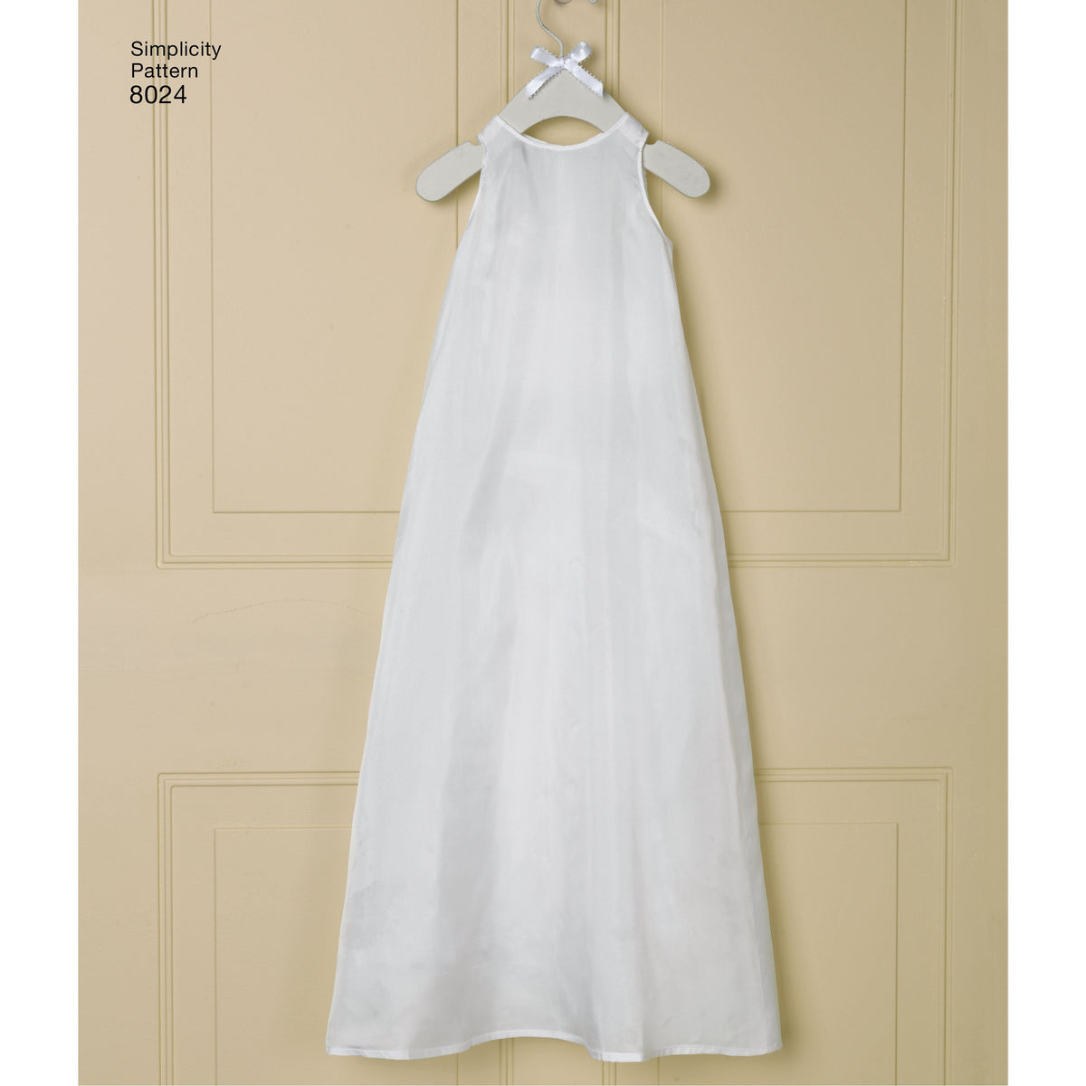 Simplicity S8024 sewing pattern envelope showing baby christening gown