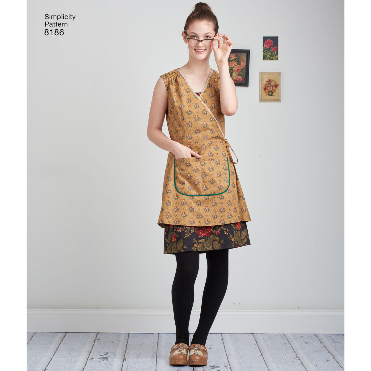 Simplicity 8186 sewing pattern envelope showing dottie angel wrap and slip dress designs