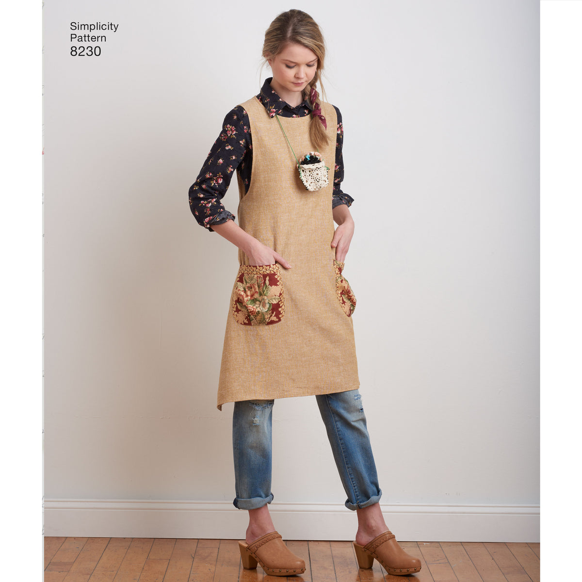 Simplicity 8230 sewing pattern envelope showing dottie angel apron dress designs