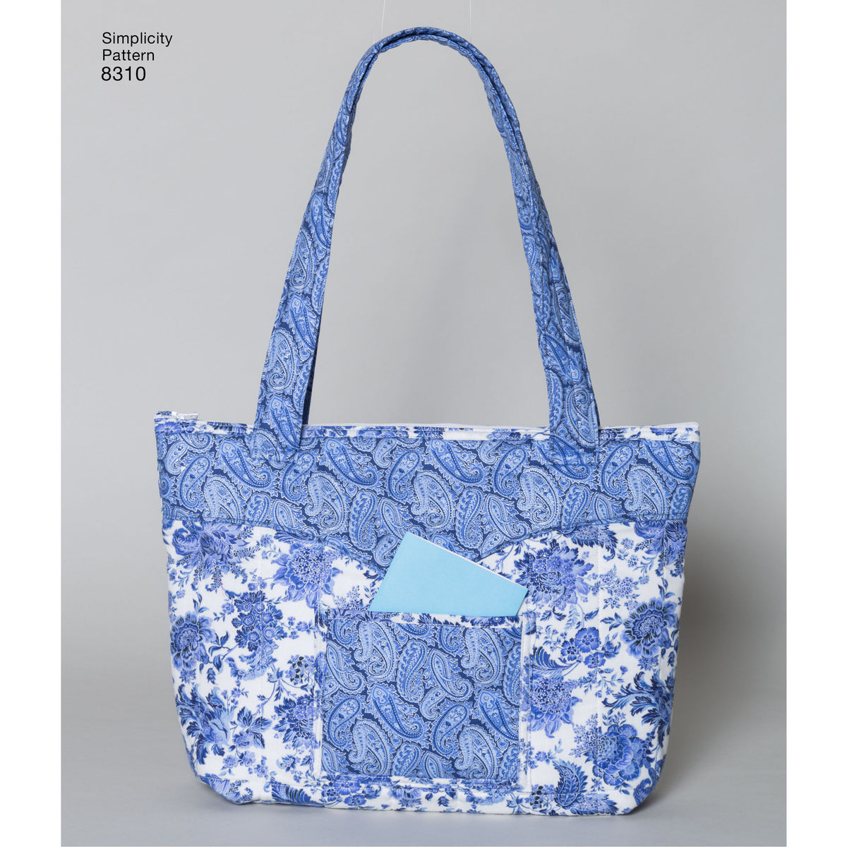 Simplicity S8310 sewing pattern envelope showing quilted backpack-style bags
