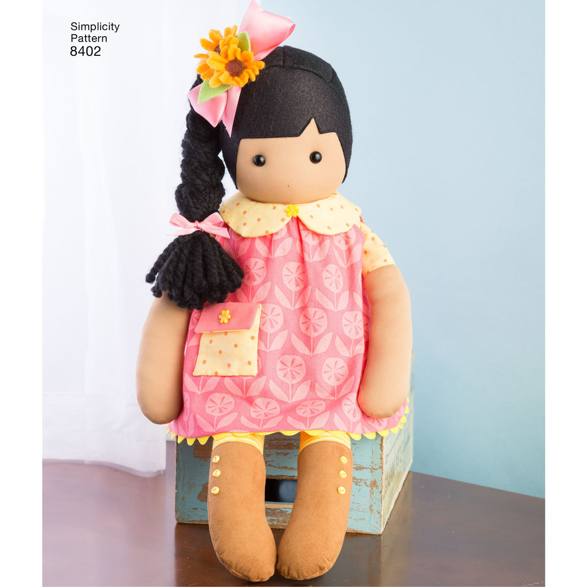 Simplicity S8402 sewing pattern envelope showing stuffed dolls with clothes