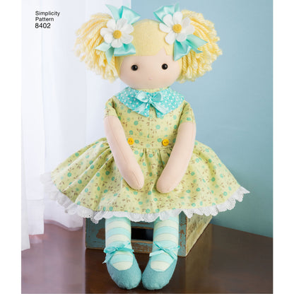 Simplicity S8402 sewing pattern envelope showing stuffed dolls with clothes