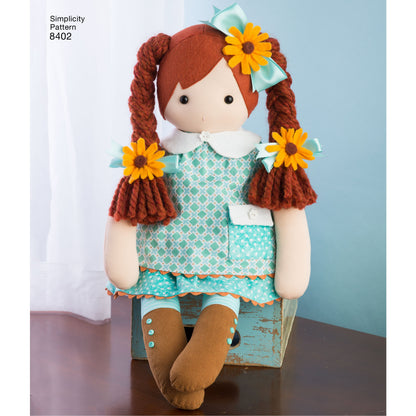Simplicity S8402 sewing pattern envelope showing stuffed dolls with clothes