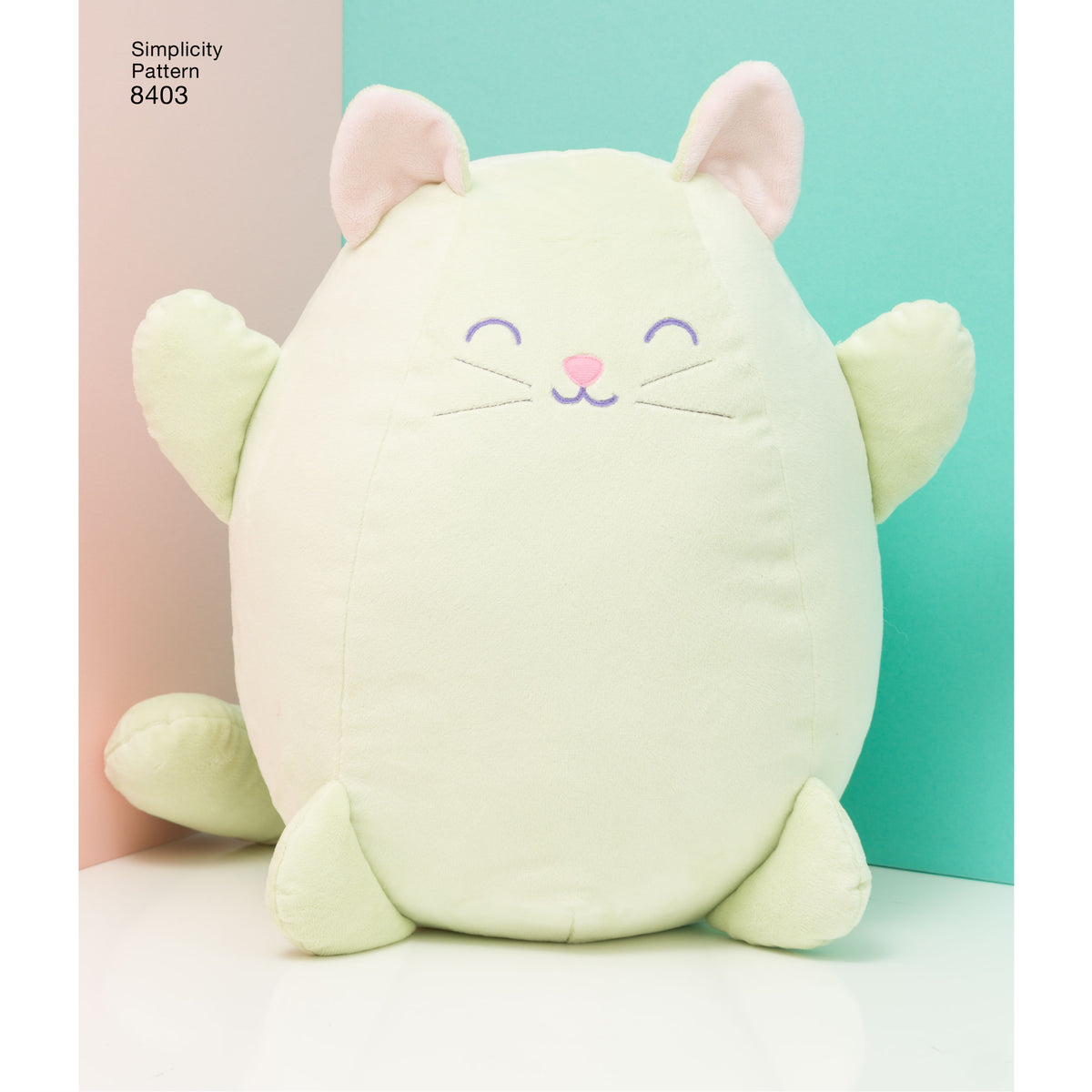 Simplicity S8403 sewing pattern envelope showing fleece stuffed cats