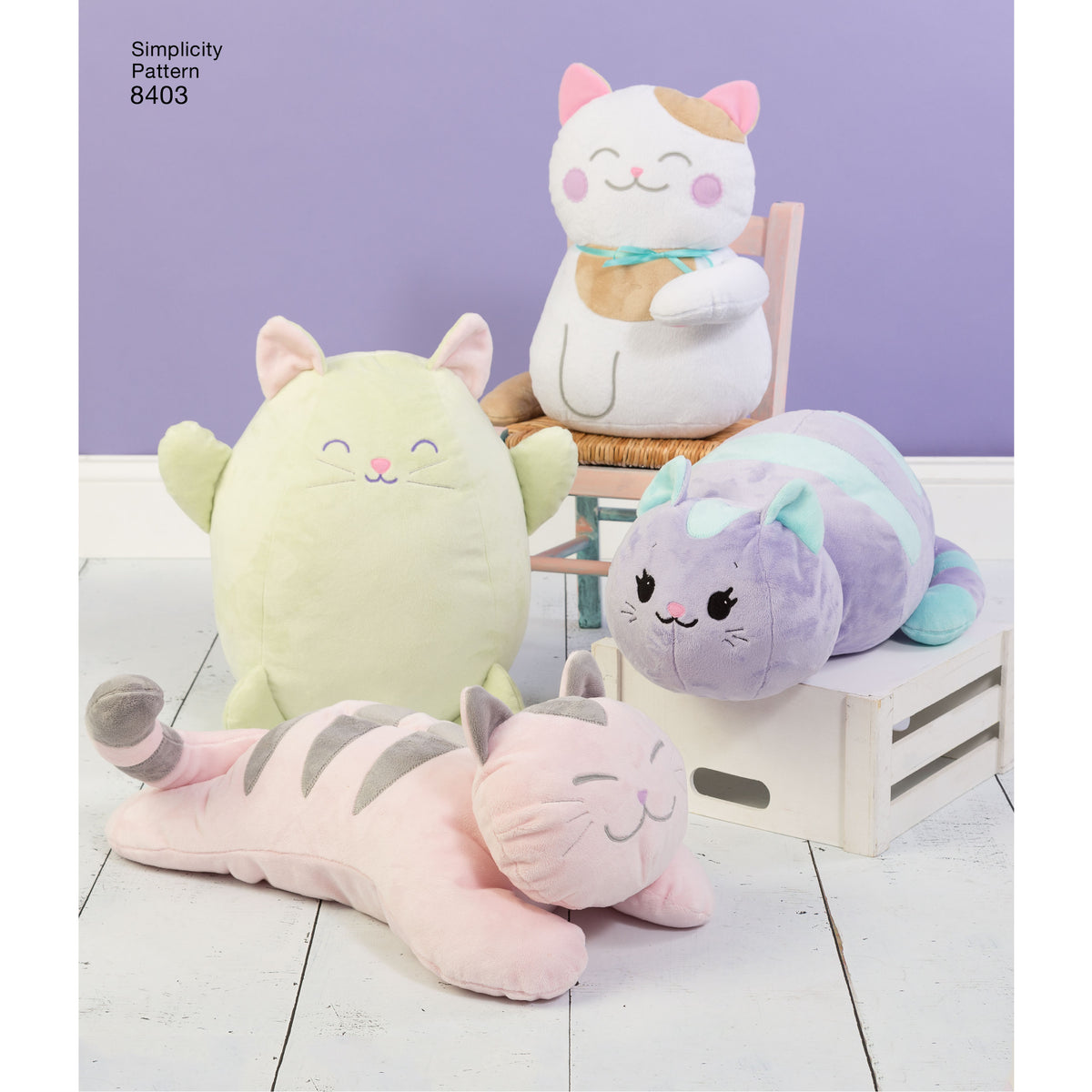 Simplicity S8403 sewing pattern envelope showing fleece stuffed cats