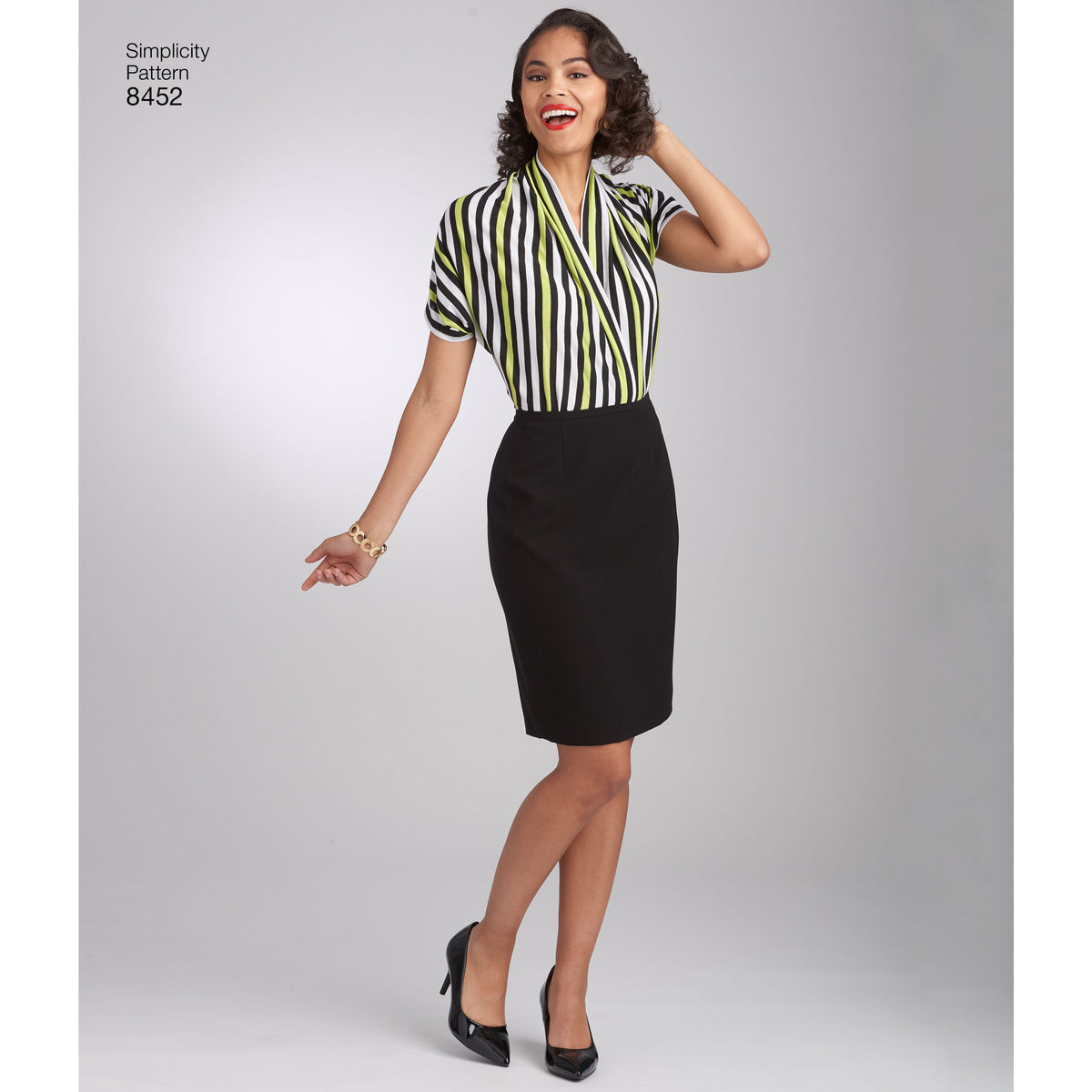 Simplicity S8452 sewing pattern envelope showing 1950s style blouses