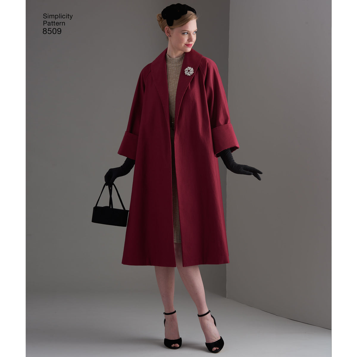 Simplicity S8509 sewing pattern envelope showing 1950s style coat and jacket