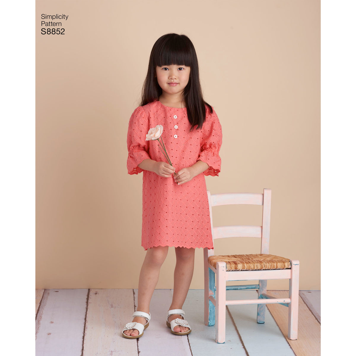 Simplicity S8852 sewing pattern envelope showing child's casual wear designs