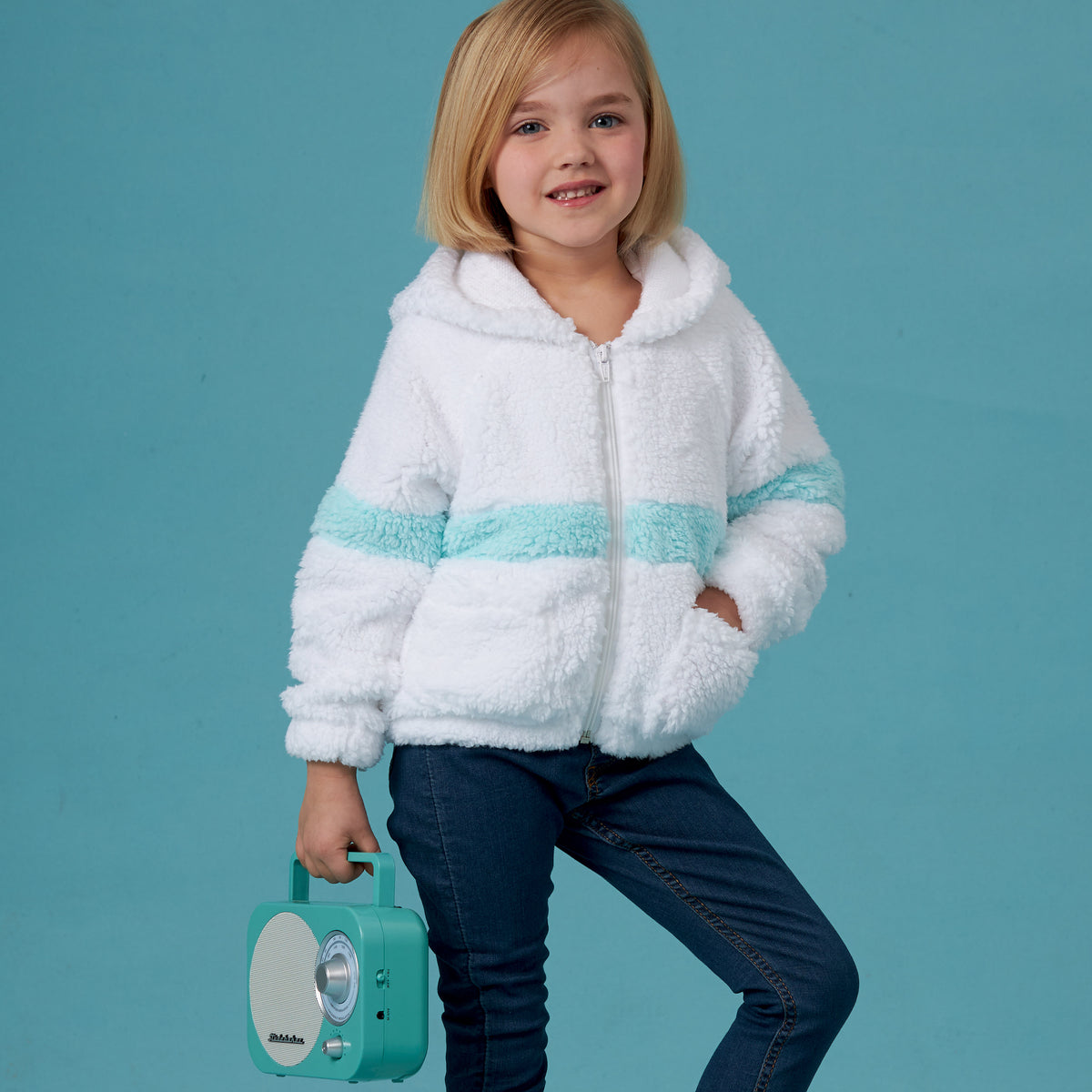 Simplicity S8999 sewing pattern envelope showing girls' hooded jackets