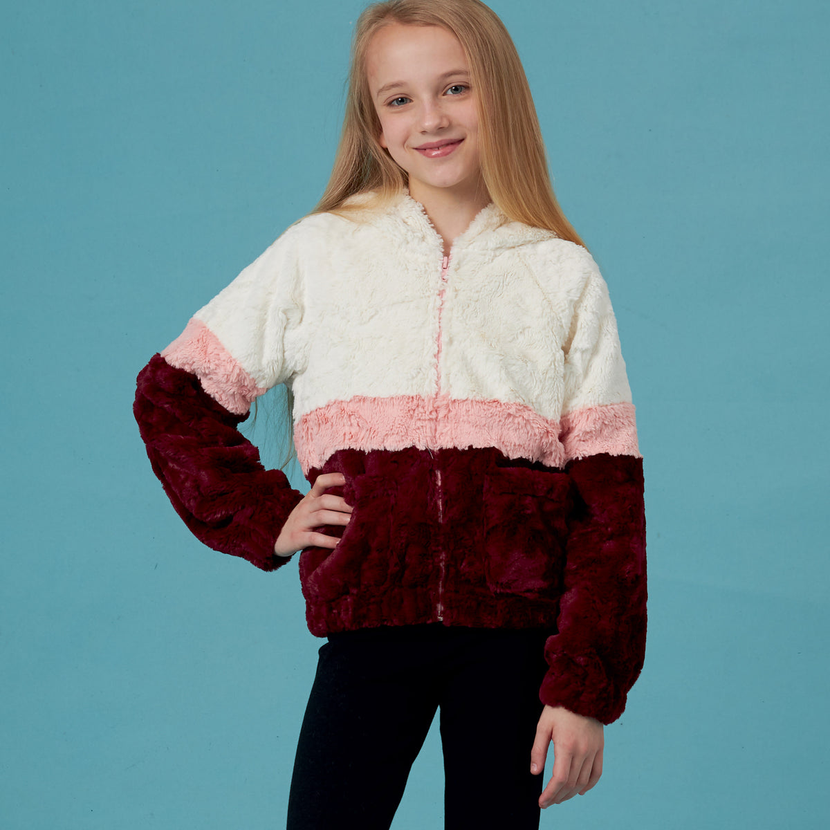 Simplicity S8999 sewing pattern envelope showing girls' hooded jackets