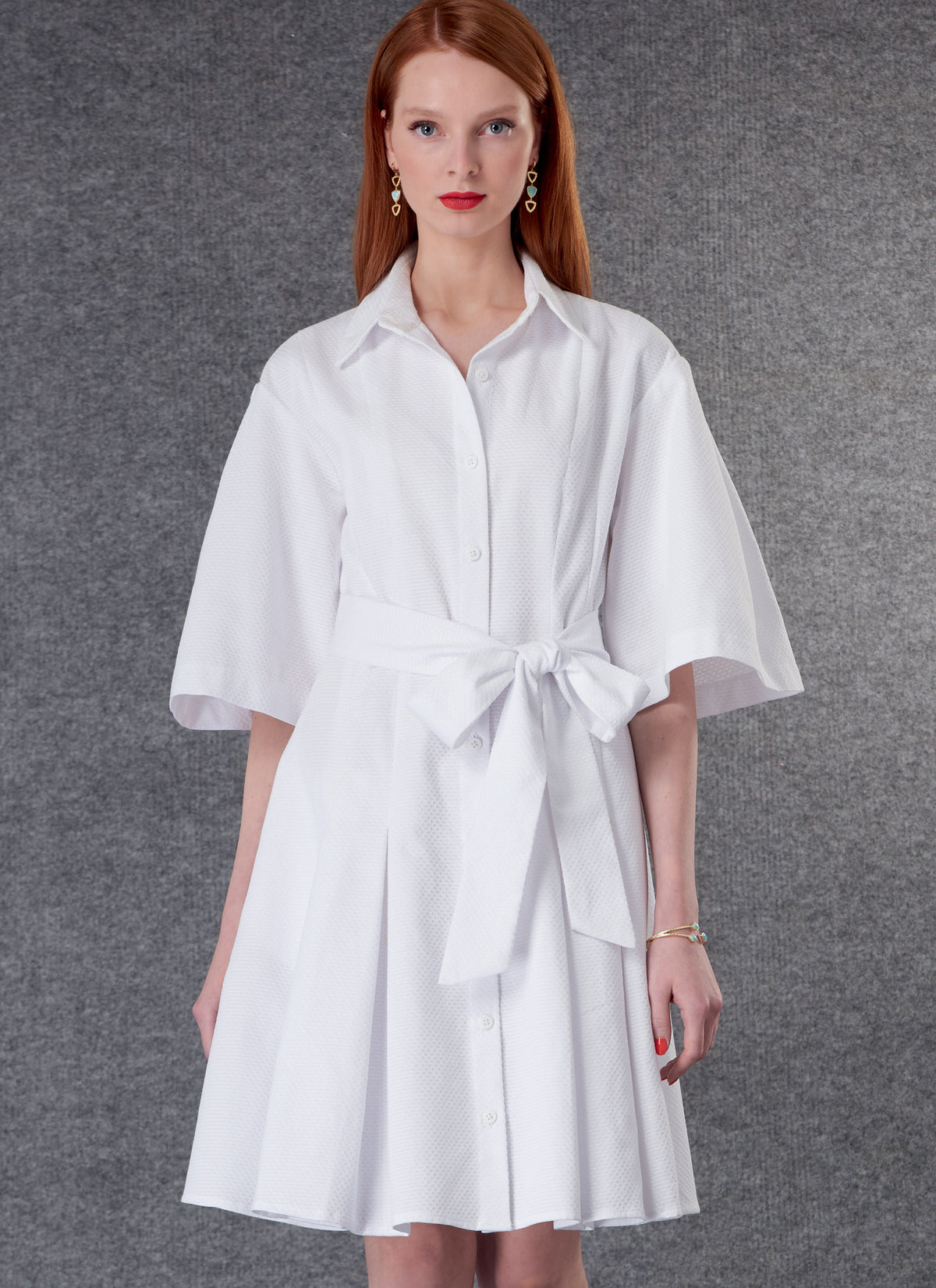 Vogue Patterns V1783 pattern envelope showing button front dress with belt