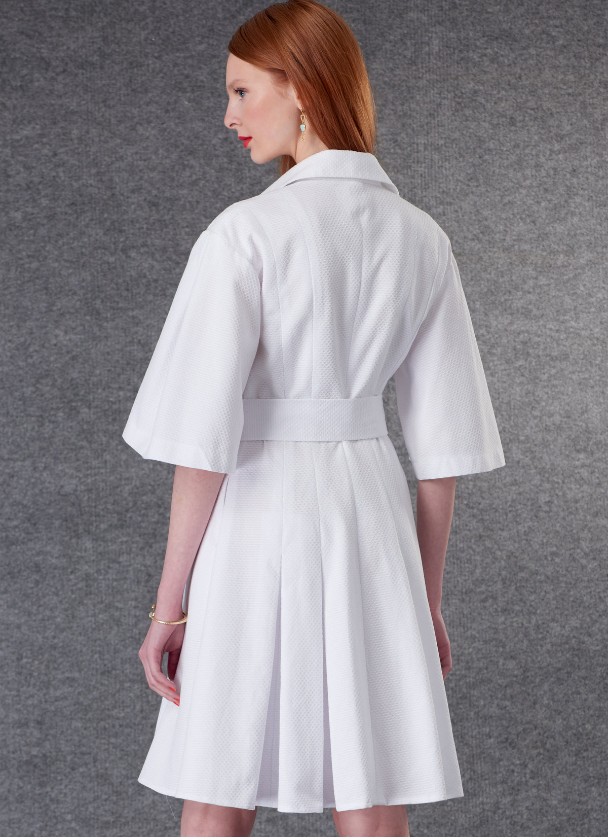 Vogue Patterns V1783 pattern envelope showing button front dress with belt