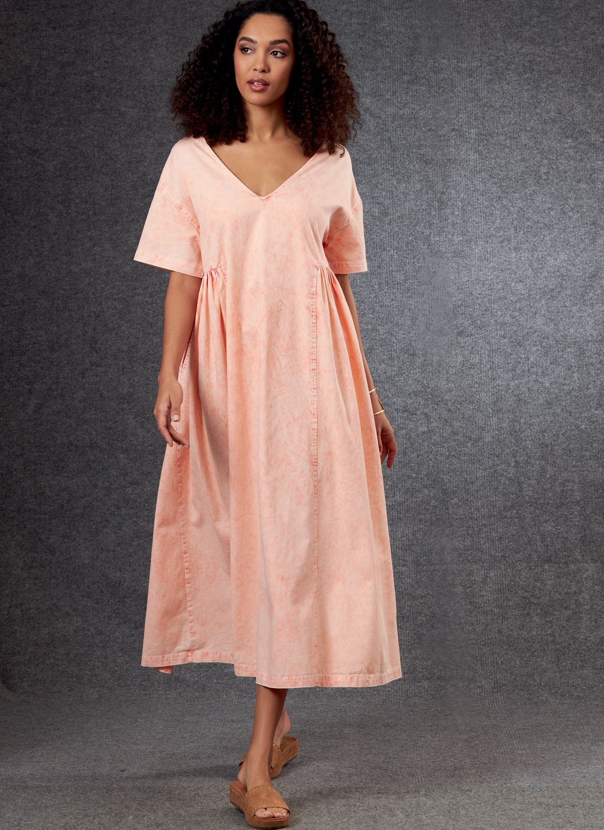 Vogue Patterns V1799 pattern envelope showing very loose-fitting, wide V-neck midi dress