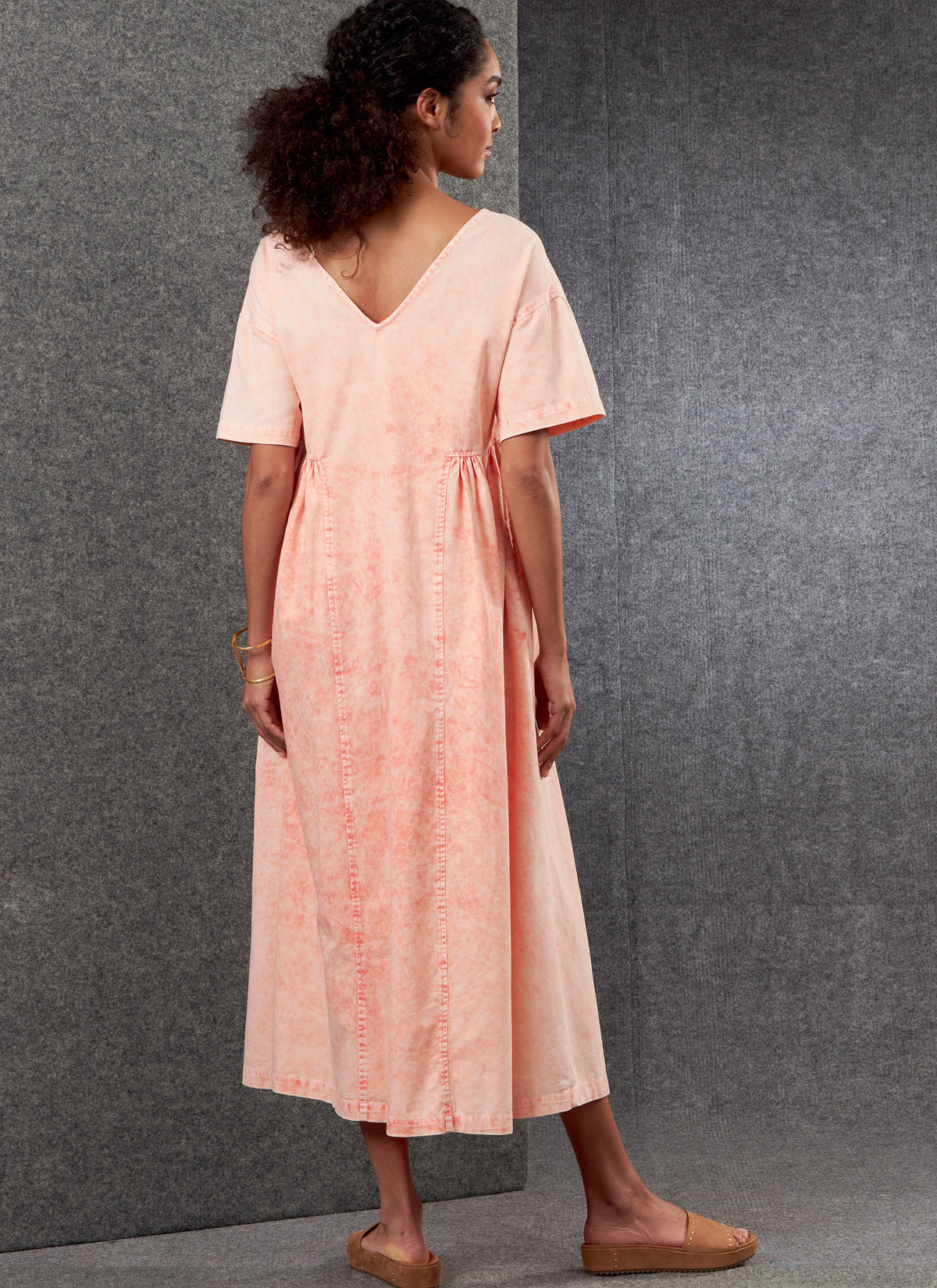 Vogue Patterns V1799 pattern envelope showing very loose-fitting, wide V-neck midi dress