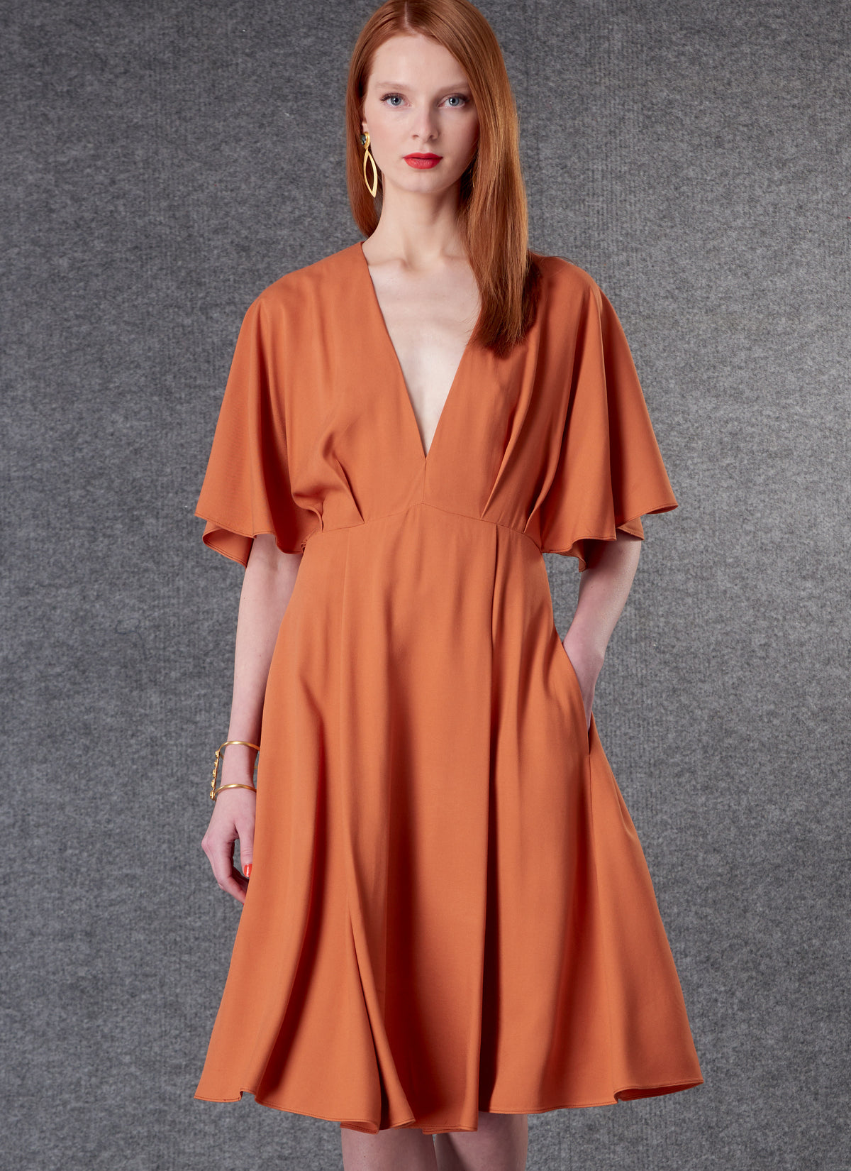 Vogue Patterns V1801 pattern envelope showing dress that is very loose-fitting at the bust