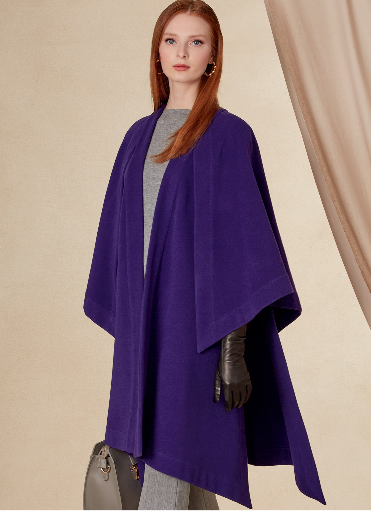Vogue Patterns V1818 envelope showing a loose-fitting unlined cape